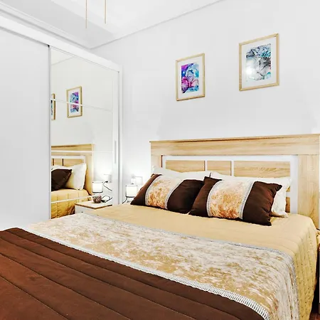 аcogedor De Dos En * Torrevieja